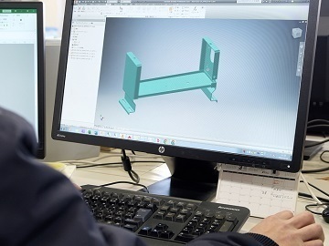 株式会社啓文社製作所【機械設計】-top